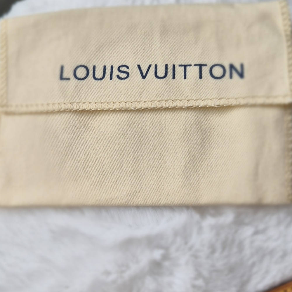 Authentic Louis Vuitton luggage tag and Bracelet set with small dust bag. - Picture 15 of 15